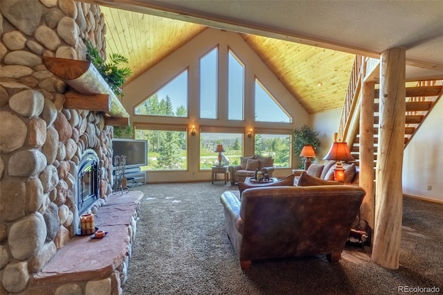 living room featuring a fireplace, carpet floors, and high vaulted ceiling