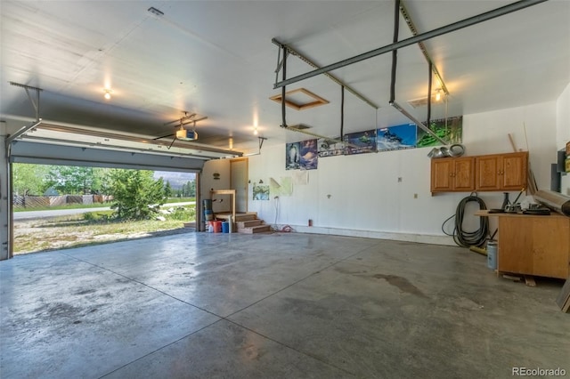 garage featuring a garage door opener