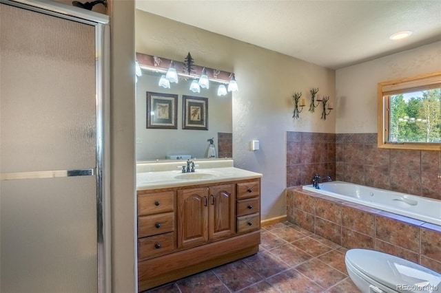 full bathroom featuring plus walk in shower, vanity, toilet, and tile patterned flooring