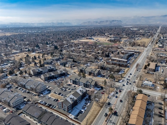 birds eye view of property featuring a mountain view