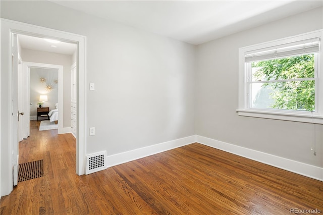 3743 N Yates St, Denver, CO 80212 - unfurnished room featuring wood finished floors and baseboards