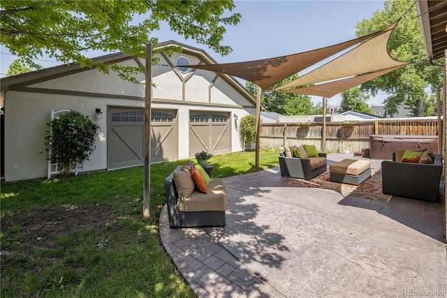 3743 N Yates St, Denver, CO 80212 - view of patio with a hot tub, an outdoor hangout area, and a garage