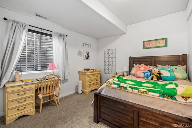 bedroom with baseboards, visible vents, and carpet flooring