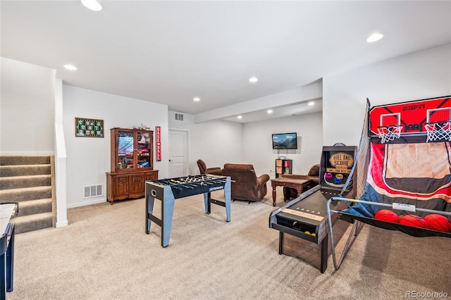 game room featuring recessed lighting, visible vents, and light colored carpet