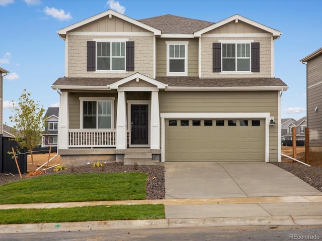 2728 73rd Avenue Ct, Greeley, CO 80634 - craftsman inspired home featuring a porch, a garage, concrete driveway, roof with shingles, and a front lawn