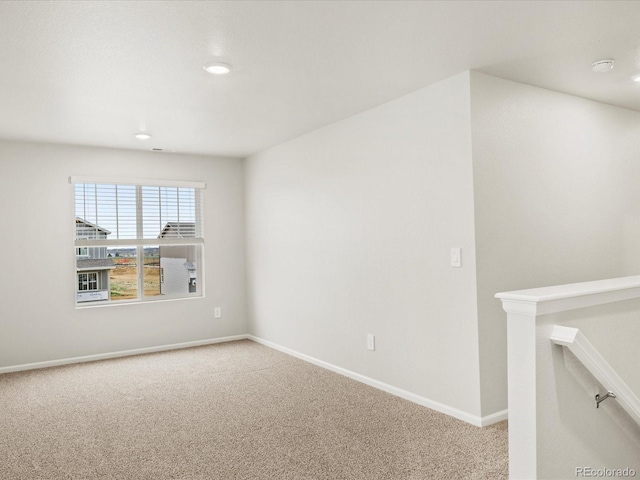 2728 73rd Avenue Ct, Greeley, CO 80634 - empty room featuring carpet flooring, baseboards, and recessed lighting