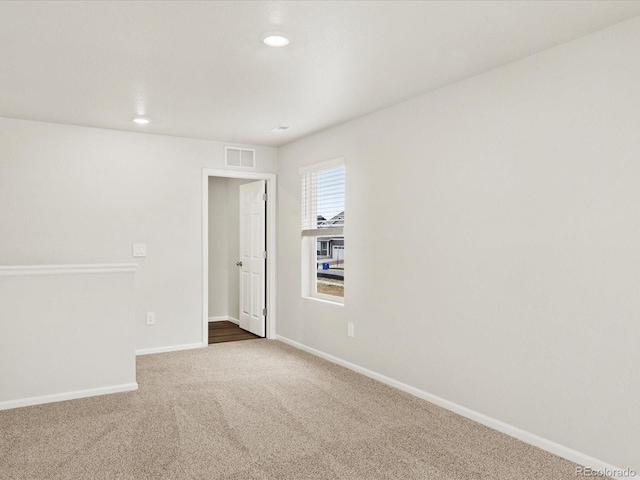 2728 73rd Avenue Ct, Greeley, CO 80634 - carpeted spare room featuring baseboards and recessed lighting