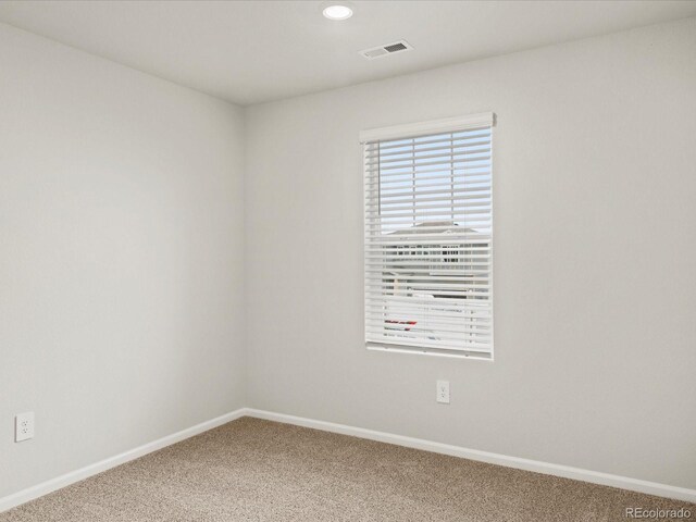2728 73rd Avenue Ct, Greeley, CO 80634 - spare room with carpet, baseboards, and recessed lighting