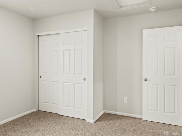 2728 73rd Avenue Ct, Greeley, CO 80634 - unfurnished bedroom with light colored carpet, a closet, and baseboards