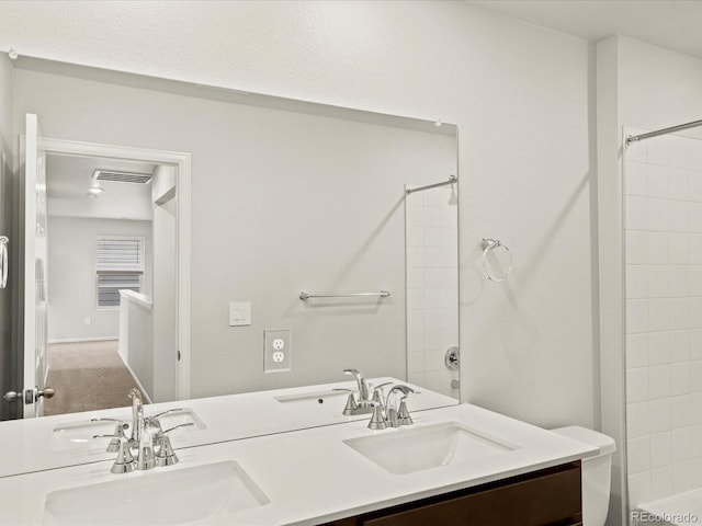 2728 73rd Avenue Ct, Greeley, CO 80634 - bathroom with double vanity and bathing tub / shower combination