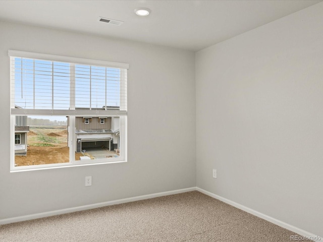 2728 73rd Avenue Ct, Greeley, CO 80634 - carpeted spare room with baseboards and recessed lighting
