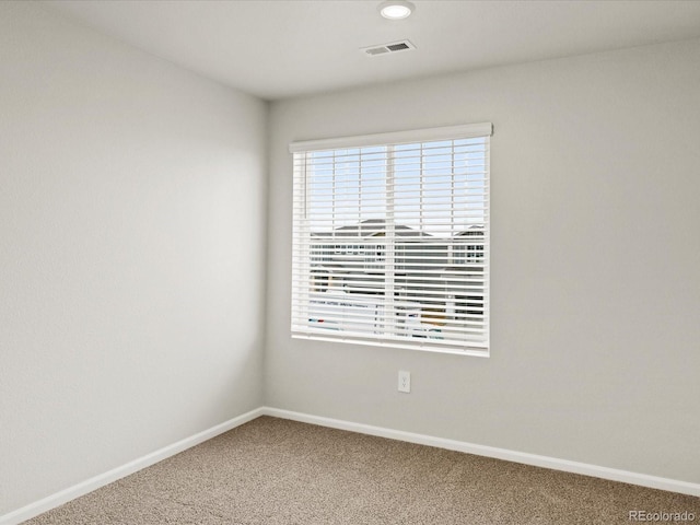 2728 73rd Avenue Ct, Greeley, CO 80634 - spare room featuring carpet, baseboards, and recessed lighting