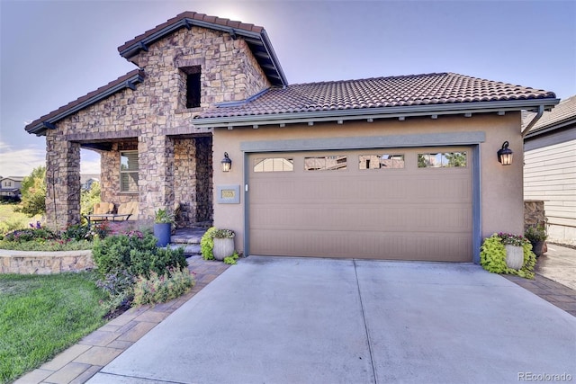 10553 Fairhurst Way, Highlands Ranch, CO 80126 - view of front facade with a tiled roof, concrete driveway, stone siding, and stucco siding