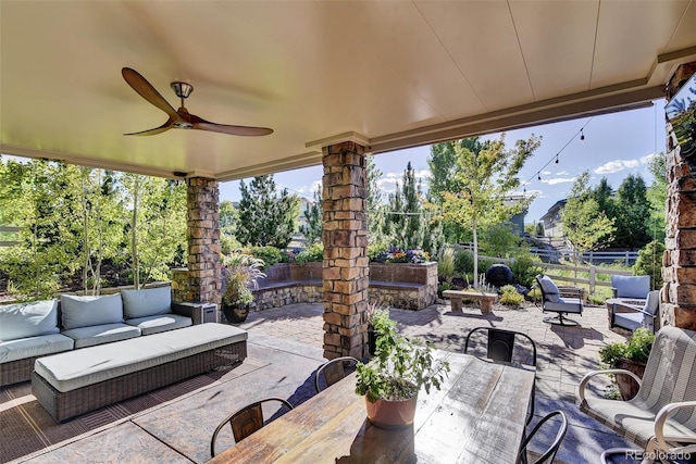 10553 Fairhurst Way, Highlands Ranch, CO 80126 - view of patio / terrace with an outdoor hangout area, a fenced backyard, outdoor dining area, and ceiling fan