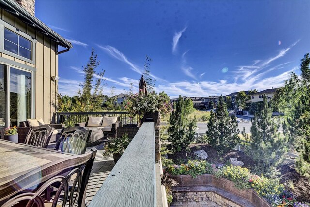 10553 Fairhurst Way, Highlands Ranch, CO 80126 - deck with an outdoor living space