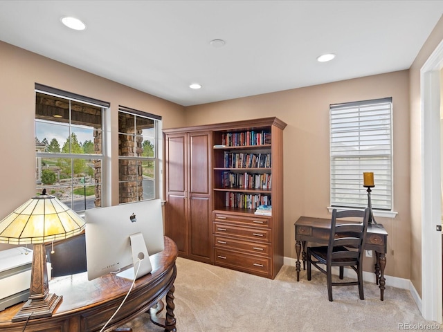 10553 Fairhurst Way, Highlands Ranch, CO 80126 - office featuring light carpet, plenty of natural light, recessed lighting, and baseboards