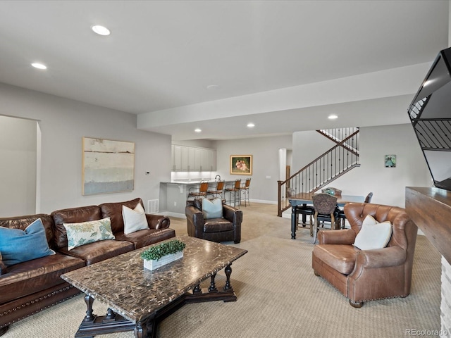 10553 Fairhurst Way, Highlands Ranch, CO 80126 - living area with stairway, recessed lighting, light carpet, and baseboards
