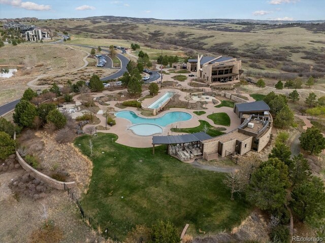 10553 Fairhurst Way, Highlands Ranch, CO 80126 - aerial view of property and surrounding area with a pool area