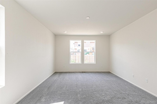 13322 E 110th Way, Commerce City, CO 80022 - carpeted empty room featuring baseboards
