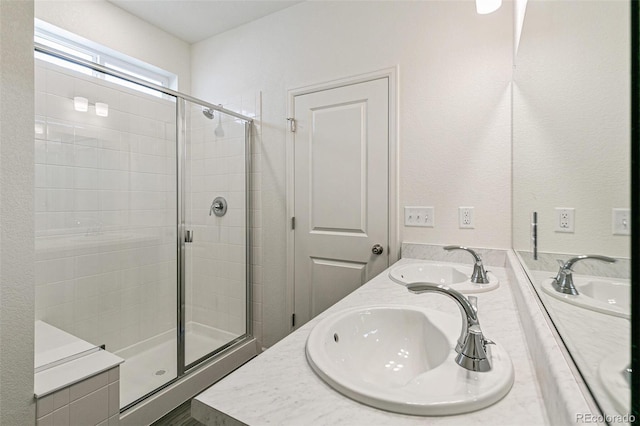 13322 E 110th Way, Commerce City, CO 80022 - full bath featuring a shower stall and double vanity
