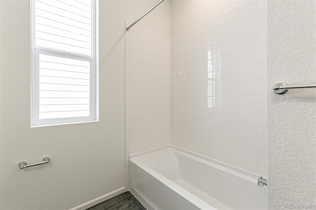 13322 E 110th Way, Commerce City, CO 80022 - full bath with healthy amount of natural light and bathtub / shower combination
