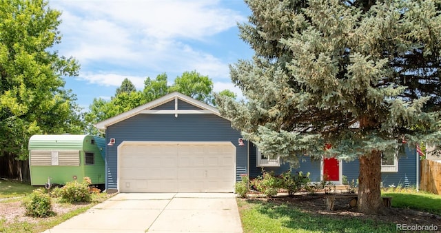 12175 Birch St, Thornton, CO 80241 - view of front of house featuring driveway and a garage
