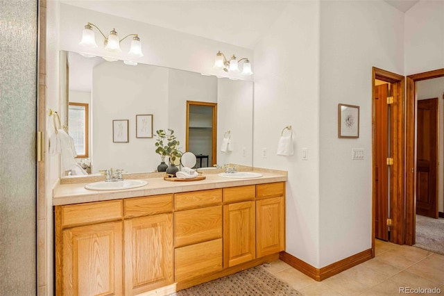 7506 Urban Ct, Arvada, CO 80005 - bathroom with double vanity and tile patterned floors
