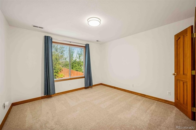 7506 Urban Ct, Arvada, CO 80005 - unfurnished room featuring light carpet