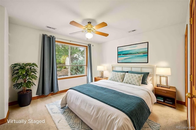7506 Urban Ct, Arvada, CO 80005 - bedroom featuring light colored carpet and ceiling fan