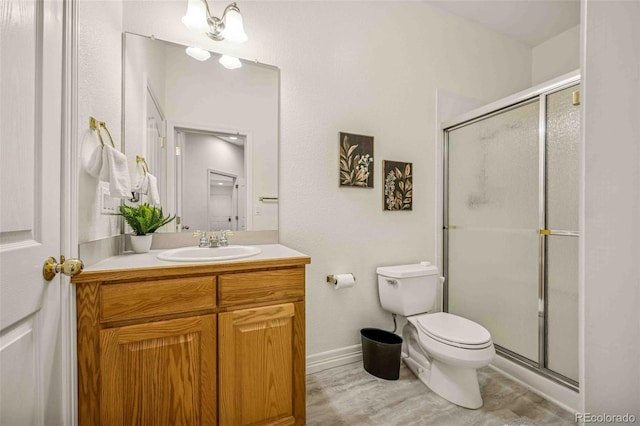 7506 Urban Ct, Arvada, CO 80005 - bathroom featuring vanity and a stall shower