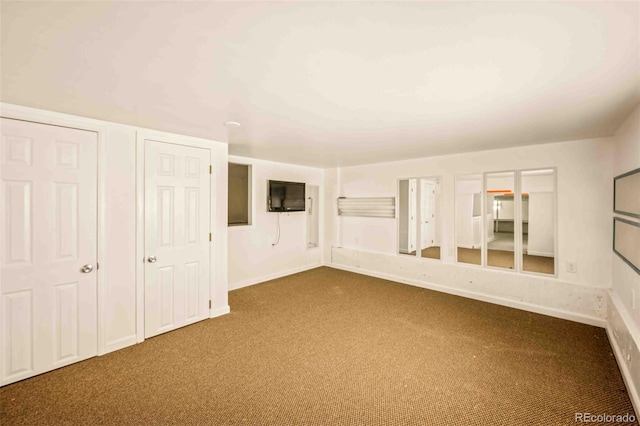 7506 Urban Ct, Arvada, CO 80005 - spare room with dark carpet and baseboards