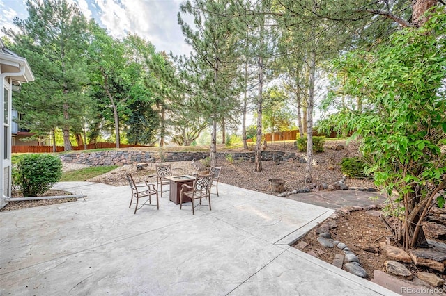 7506 Urban Ct, Arvada, CO 80005 - view of patio with an outdoor fire pit
