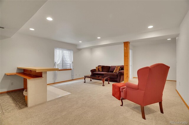 living area featuring baseboards, carpet floors, visible vents, and recessed lighting