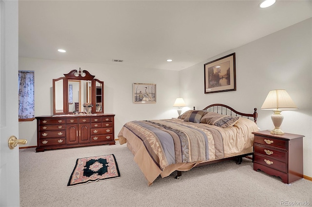 carpeted bedroom with baseboards, visible vents, and recessed lighting