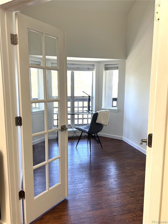 1000 E 1st Ave Unit 405, Denver, CO 80218 - office area with baseboards and dark wood finished floors