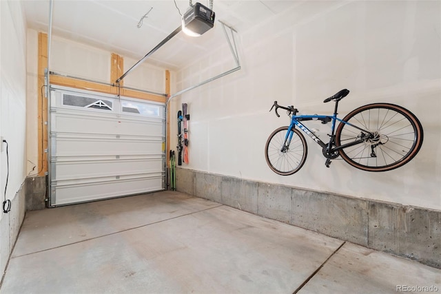 5745 S Buchanan Ct Unit C, Aurora, CO 80016 - garage featuring a garage door opener