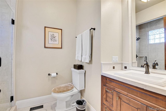 bathroom featuring walk in shower, vanity, toilet, tile patterned floors, and decorative backsplash