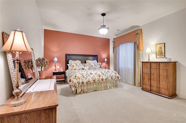 bedroom featuring ceiling fan and light colored carpet