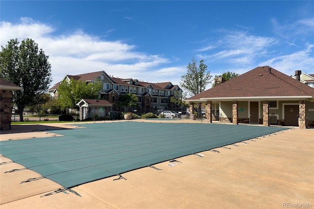 view of swimming pool with a patio