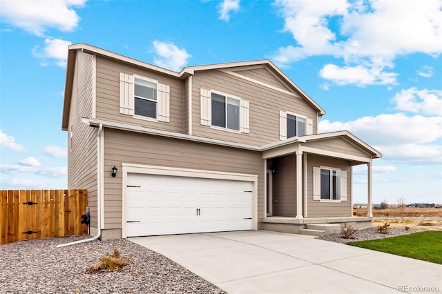 2175 Alyssa St, Fort Lupton, CO 80621 - traditional home featuring covered porch, an attached garage, and driveway