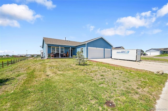 199 S 4th Ave, Deer Trail, CO 80105 - ranch-style home with an attached garage and driveway