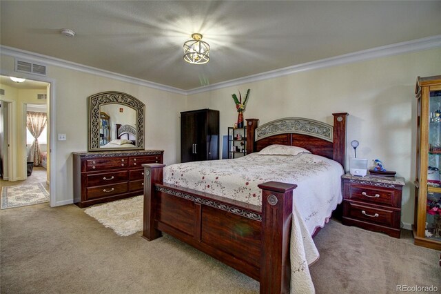 bedroom with baseboards, visible vents, ornamental molding, and light colored carpet