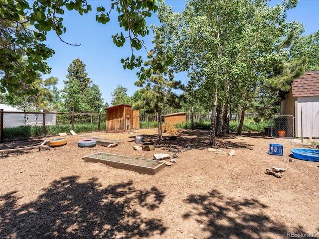 689 S Pine Dr, Bailey, CO 80421 - view of yard featuring a storage shed