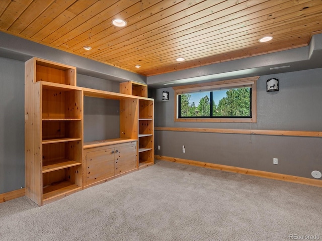 689 S Pine Dr, Bailey, CO 80421 - unfurnished living room with wood ceiling, carpet, and recessed lighting