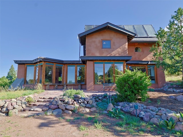 551 Panorama Way, Crestone, CO 81131 - rear view of property with stucco siding