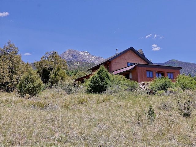 551 Panorama Way, Crestone, CO 81131 - view of property exterior featuring a mountain view