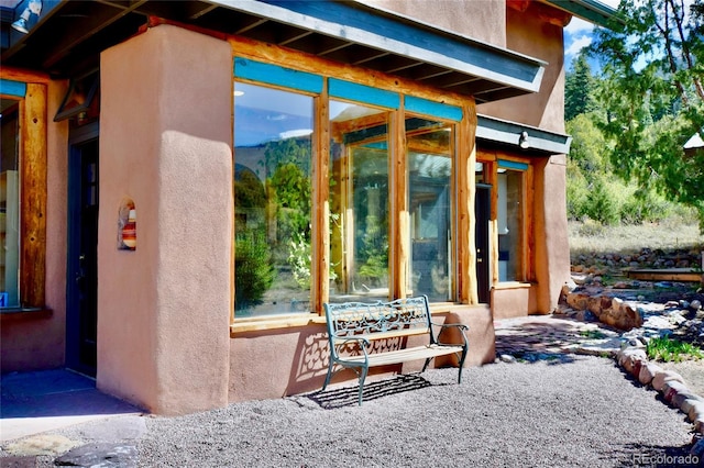 551 Panorama Way, Crestone, CO 81131 - view of patio featuring a sunroom