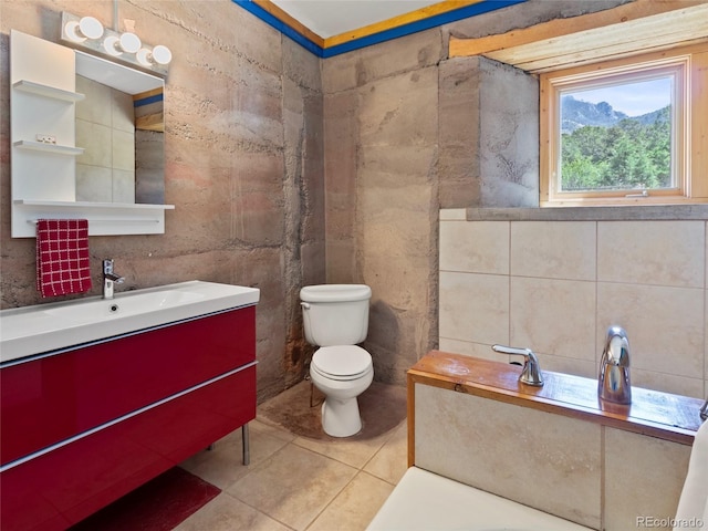 551 Panorama Way, Crestone, CO 81131 - bathroom featuring tile walls, vanity, and tile patterned floors