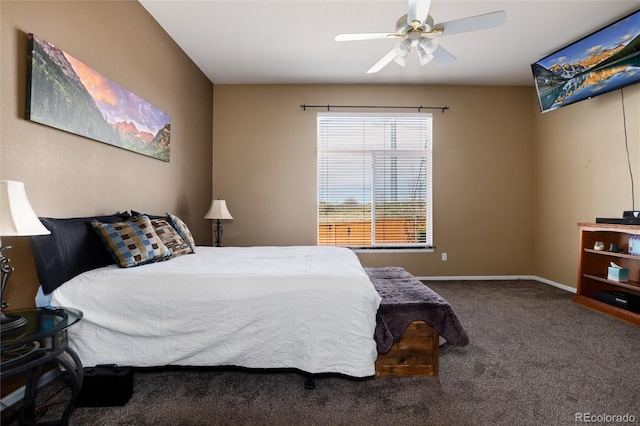 carpeted bedroom featuring baseboards and ceiling fan