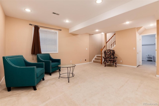 living area featuring carpet floors, baseboards, recessed lighting, and stairs